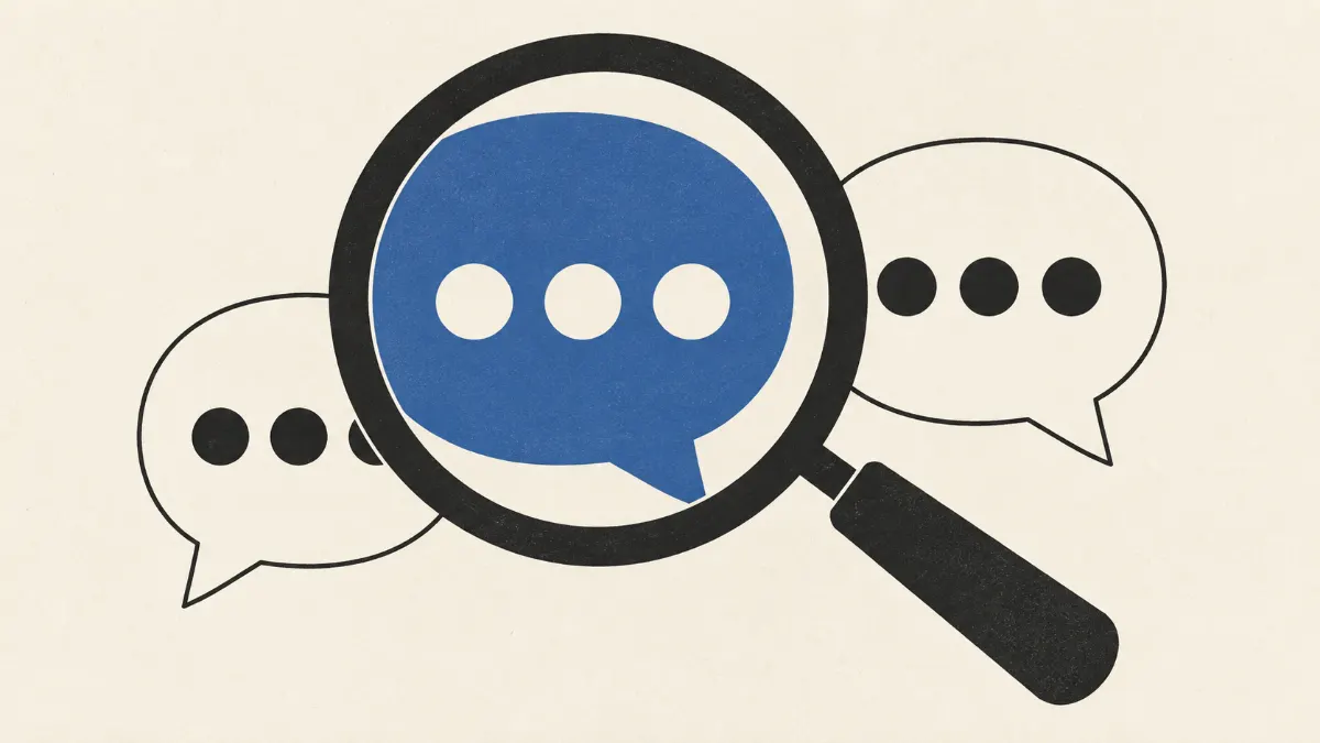 Magnifying glass over blue and ivory conversation bubbles